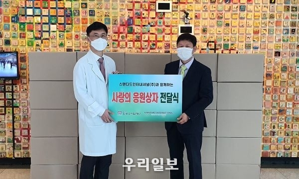 왼쪽부터 서울아산병원 종양혈액과 고경남교수, 한국소아암재단 홍승윤 사무국장
